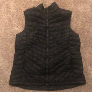 Black northface puffy vest